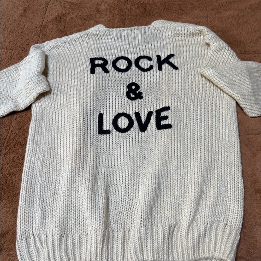 Chic Cream Sweater with Black Text